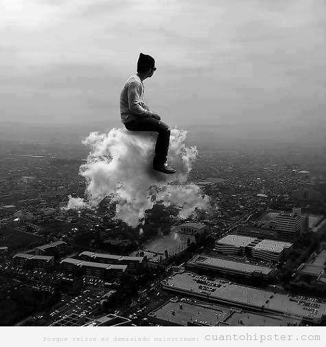 Imagen indie bonita, chico hipster snetado en una nube
