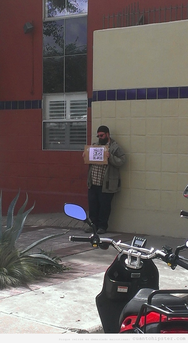 Homeless hipster con código QR en un cartel