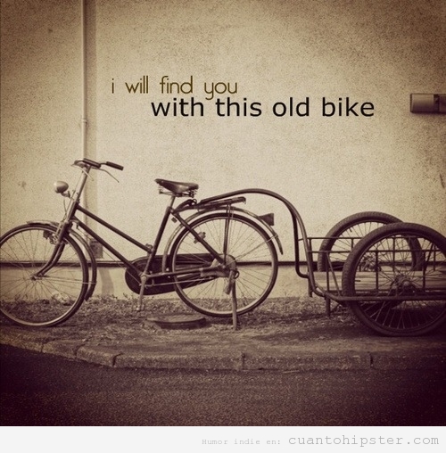 Foto de una bici antigua vintage con remolque