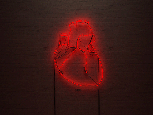 Corazón realista hecho con luces de neón